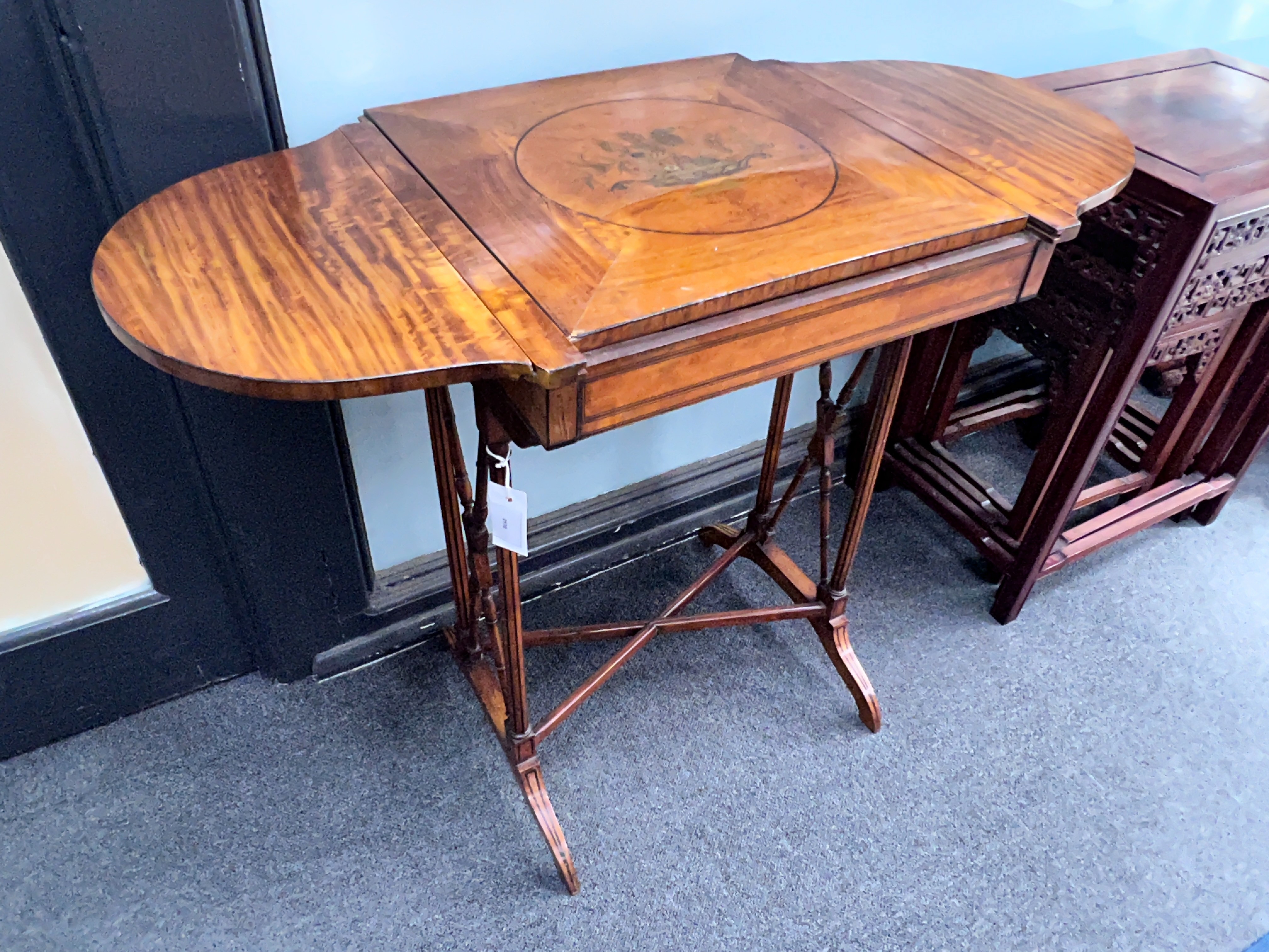 An Edwardian marquetry inlaid satinwood occasional table